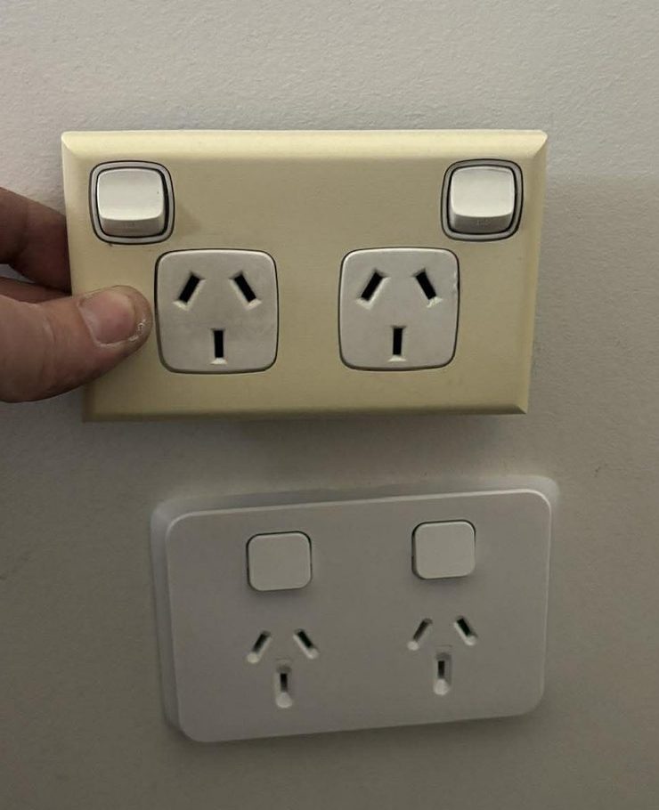 Old cream powerpoint above a modern white double GPO, side-by-side comparison by Nate's Rates Electrical