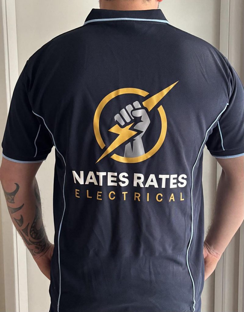 Nate's Rates Electrical branded polo shirt with the gold fist and lightning bolt logo on the back